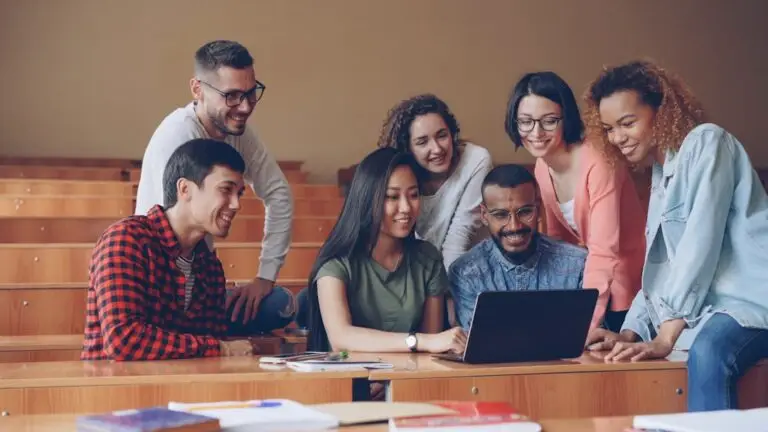 Students using a laptop representing MP Laptop Yojana 2026 benefits